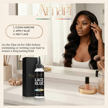 Amari Magic Glow 150ml lace glue bottle and box on a vanity with a woman wearing a wig in the background.