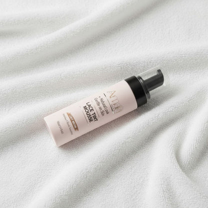 Amari Magic Glow Lace Tint Mousse in Light Brown, 100ml bottle for a natural look and gentle on skin.